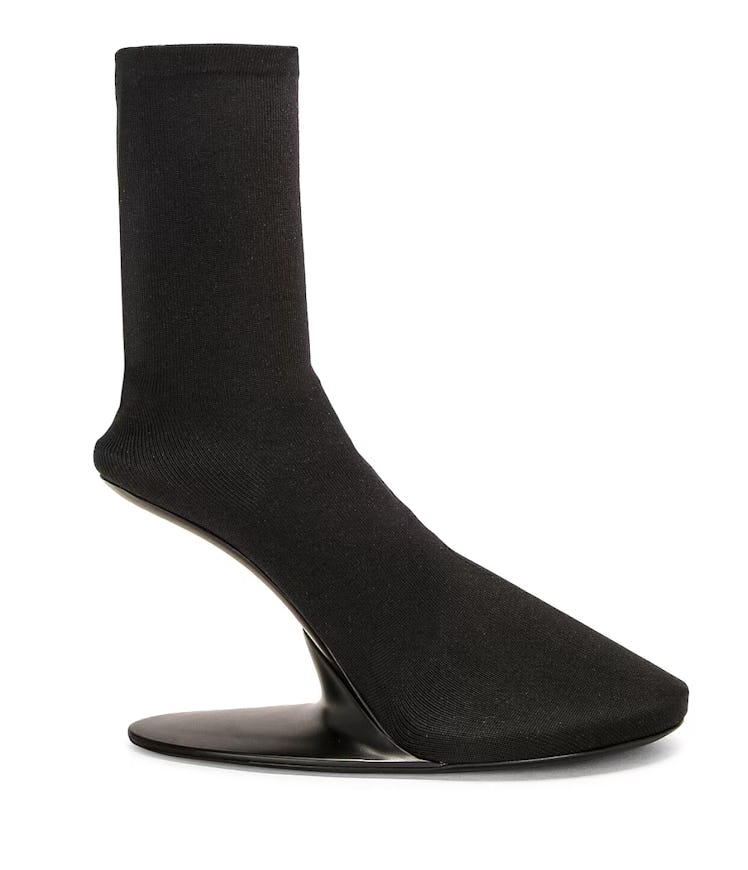 black heel-less boot