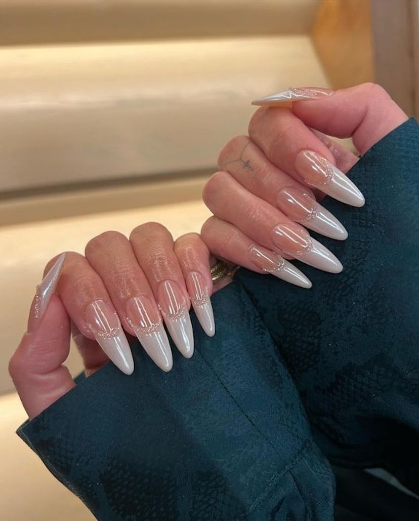 Zola Ganzorigt created Vanessa Hudgens' pearl-lined, chrome French tip wedding nails with OPI produc...