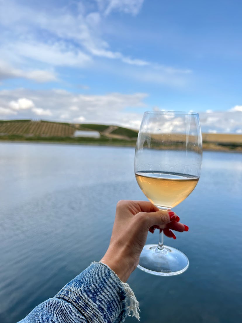 Enjoying a glass of Grosgrain Vineyards wine at Eritage Resort.