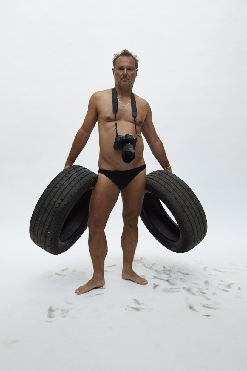 Juergen Teller, “Self-portrait with tyres.” London, 2021.
