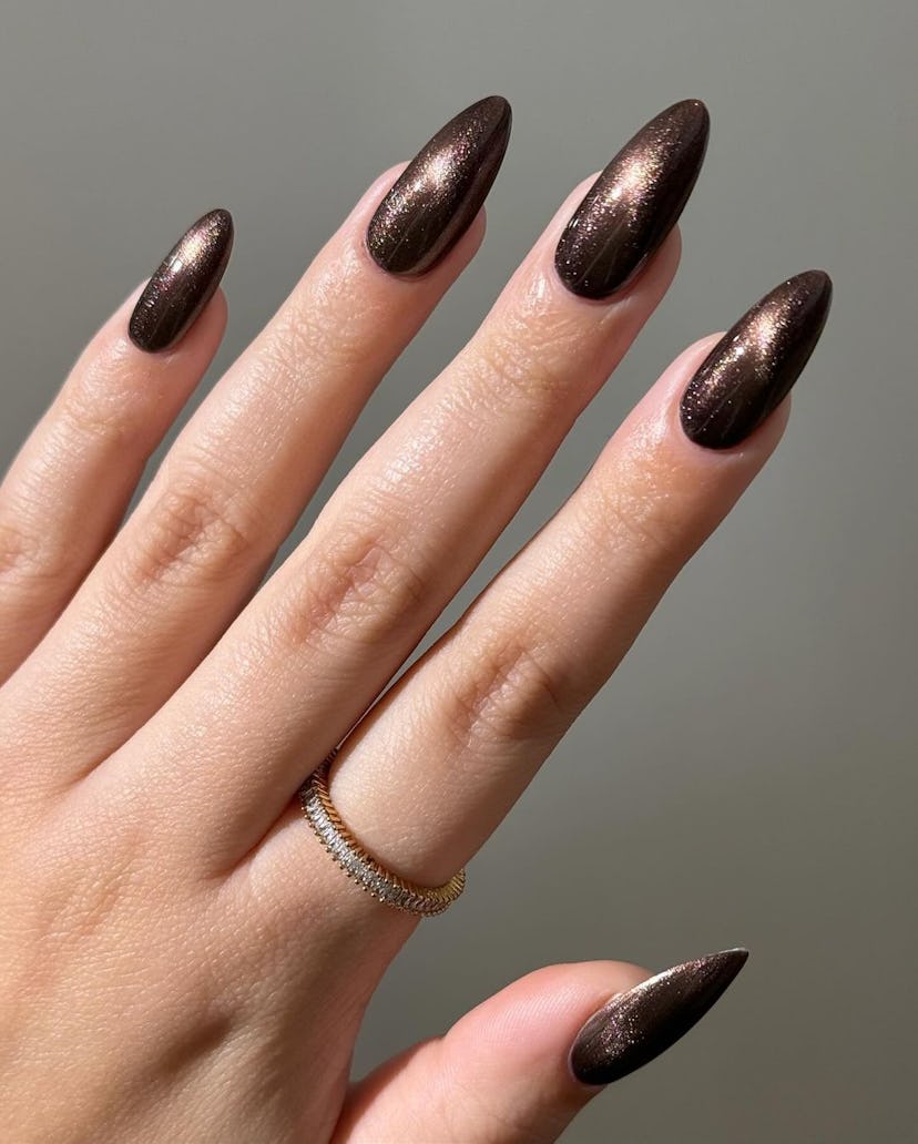 Chrome bronze nail polish shades an on-trend holiday nail polish color for 2023.