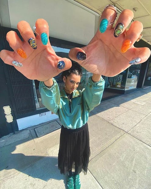 Meet the 0.5 nail selfie trend, the perfect way to show off your manicure.