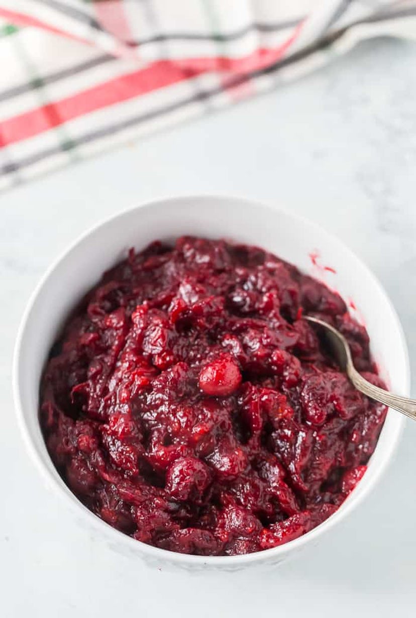 A make-ahead Christmas dinner side dish, hot buttered rum cranberry sauce.