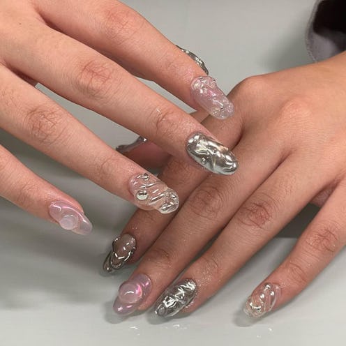 Oyster nails take mermaidcore to a whole new level.