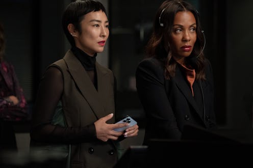 Greta Lee and Karen Pittman wearing suits
