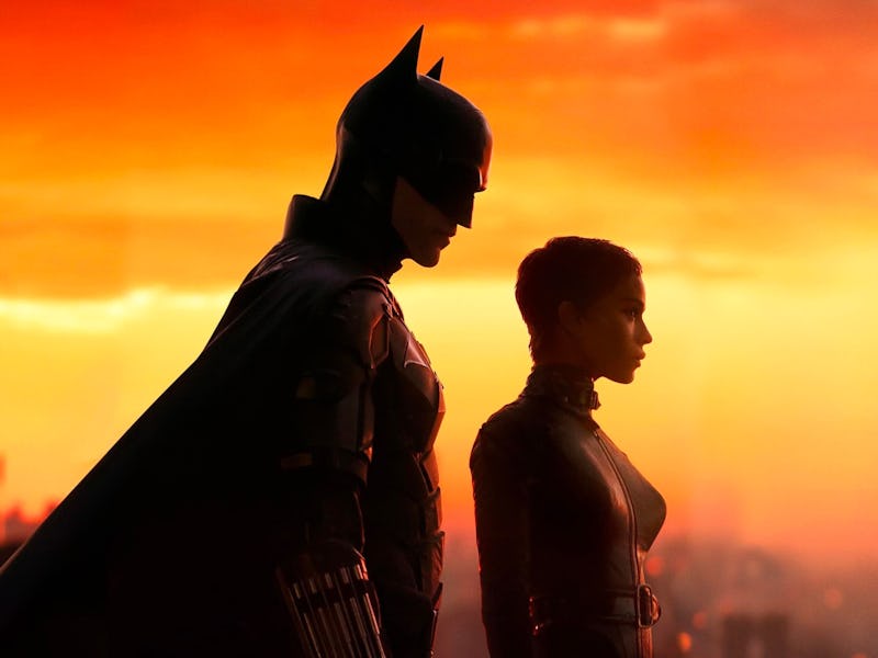 Robert Pattinson as Bruce Wayne/Batman and Zoë Kravitz as Selina Kyle/Catwoman in The Batman