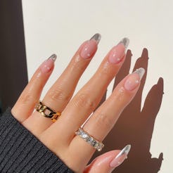 Here are 10 New Year's Eve press-on nails that are on-trend for 2023.