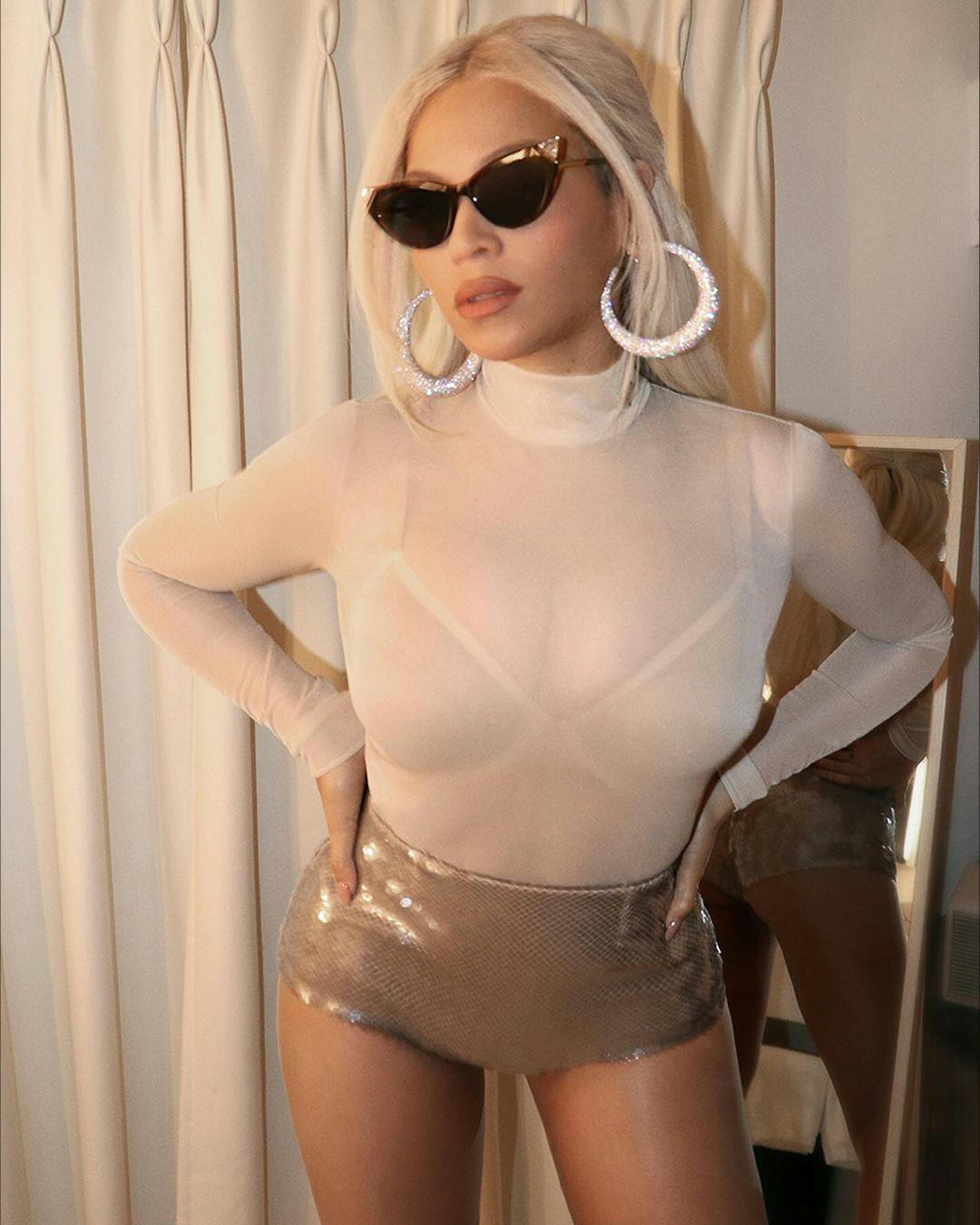 Beyoncé wears sequined Prada underwear as pants and a fur coat