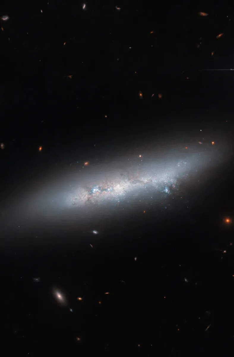 Irregular Space New Hubble Image Captures a Galaxy In Perhaps Its Most Disheveled State