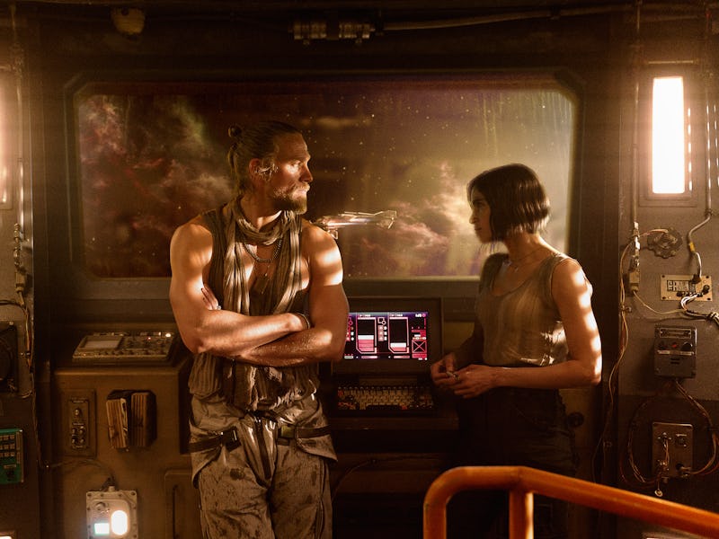 Charlie Hunnam as Kai and Sofia Boutella as Kora in Rebel Moon — Part One: A Child of Fire