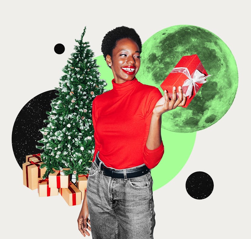 A young woman with a present, thinking about her Christmas 2023 horoscope