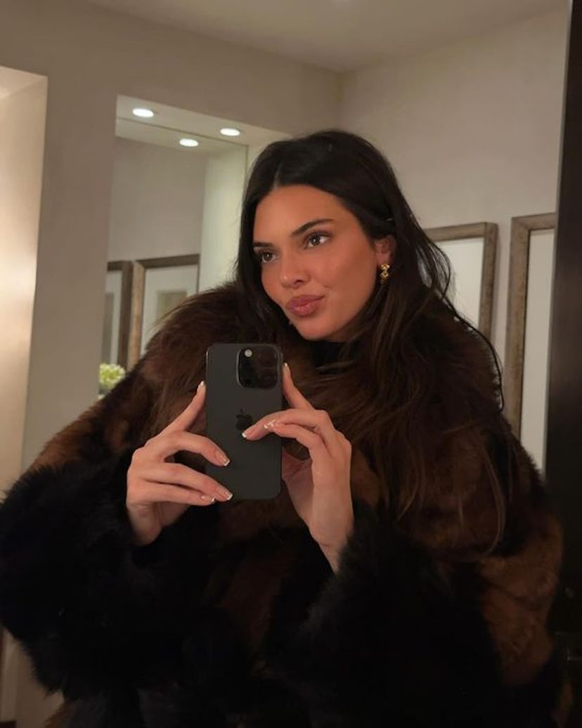 Kendall Jenner wore short, square-shaped French tip nails while traveling in Aspen, Colorado in Dec....