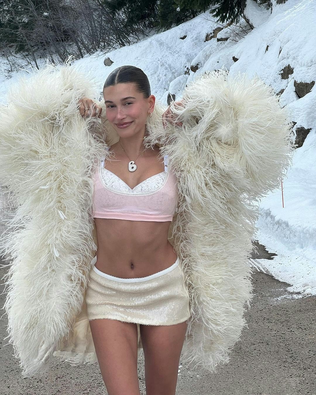 Hailey Bieber Flashes a Lace Bra From Under an Icy Cavalli Coat