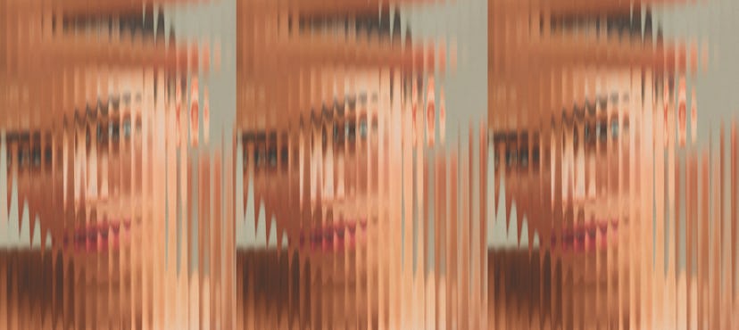 Abstract image showing a distorted, repeated portrait of a person’s face with a glitch art effect cr...