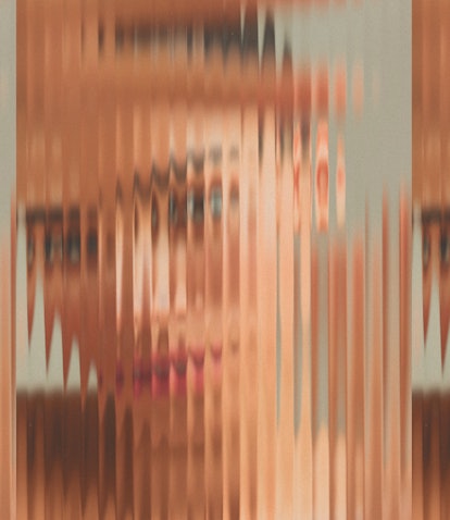 Abstract image showing a distorted, repeated portrait of a person’s face with a glitch art effect cr...