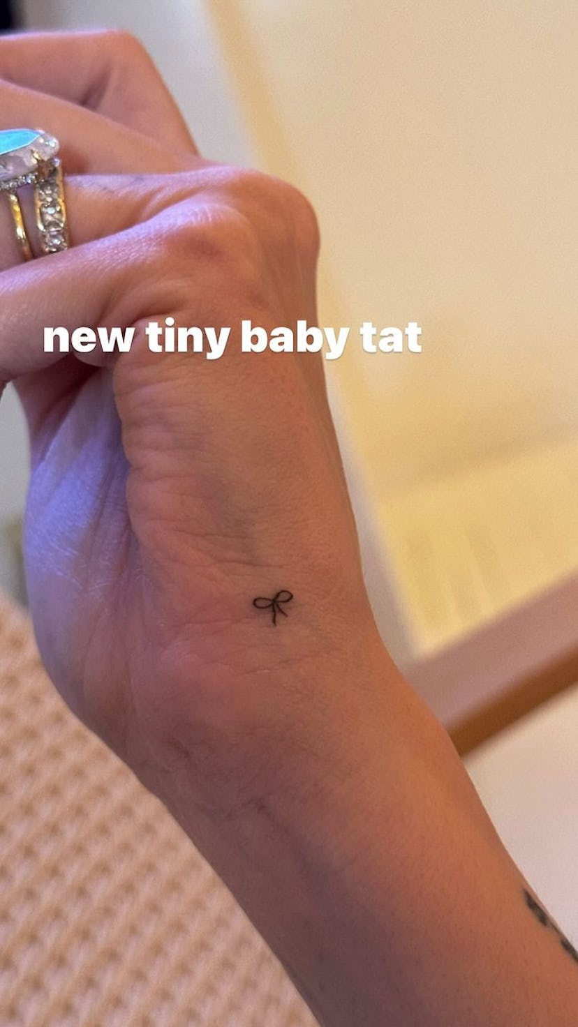 On Dec. 20, 2023, Hailey Bieber shared her new fine line micro bow tattoo on Instagram stories.