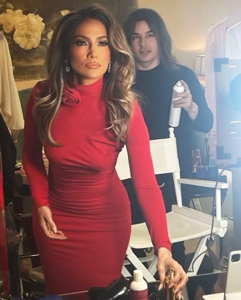 Jennifer Lopez wore a skin-tight red maxi dress perfect for holiday parties