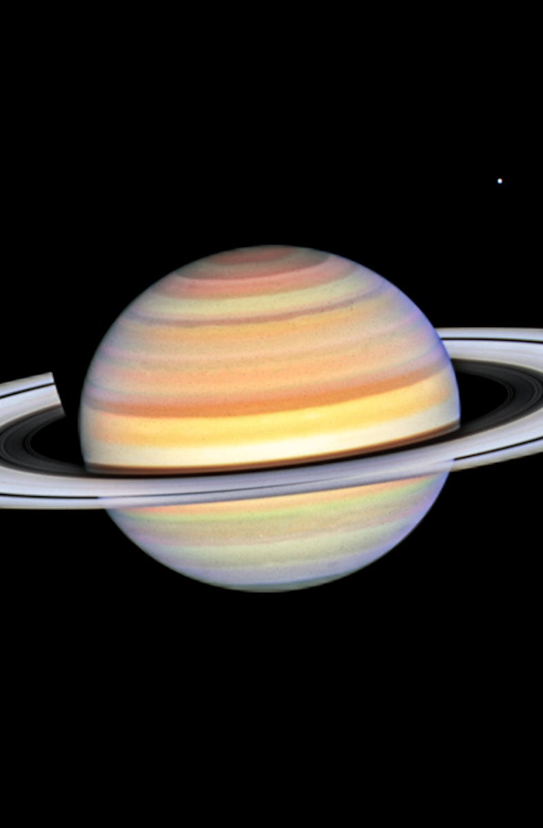 Saturn's body is decorated with many thick and thin stripes. Its rings are made of many concentric c...