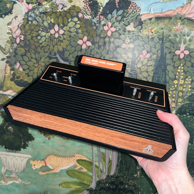Atari 2600+ retro console in hand