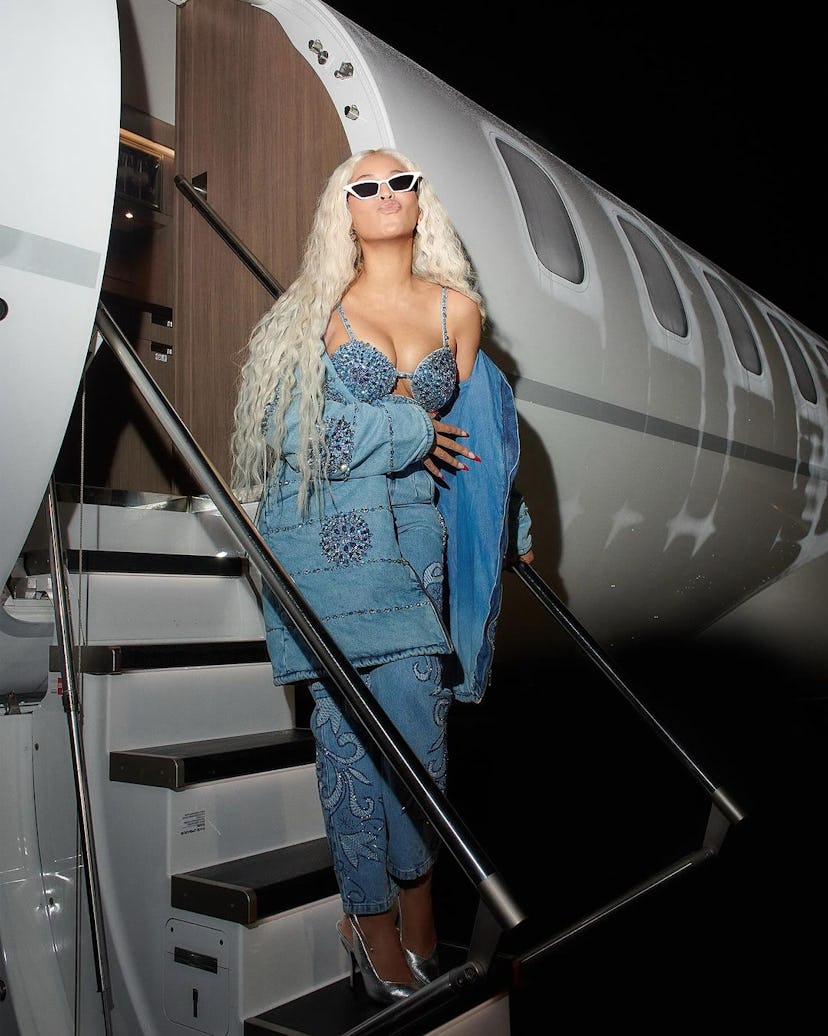 Beyoncé wore a crystal-encrusted denim bra, jeans, and jacket.