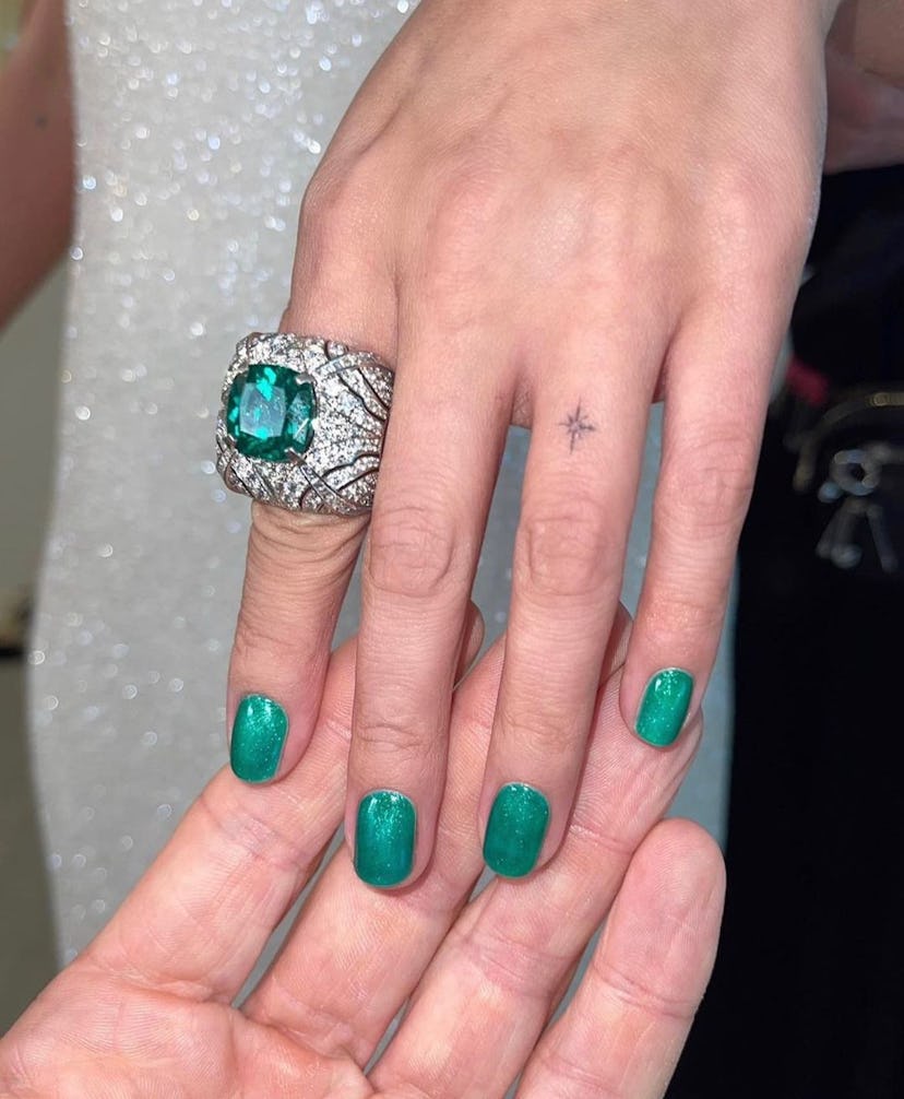 One of the most popular winter nail polish color trends for 2024 is green.