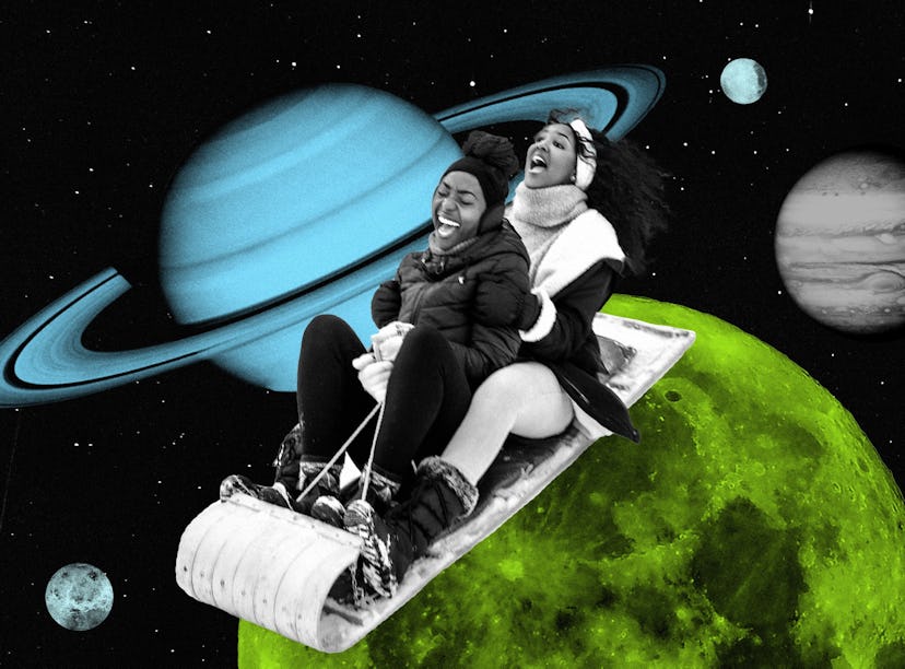 Two women sledding on a planet after reading their January 2024 horoscope.
