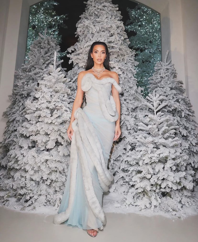 Kim Kardashian wore a Martha May Whovier-inspired archival Mugler 1997 gown for her annual Christmas...