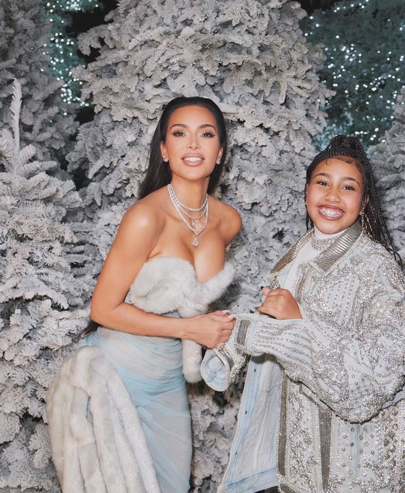 Kim Kardashian wore a Martha May Whovier-inspired archival Mugler 1997 gown for her annual Christmas…