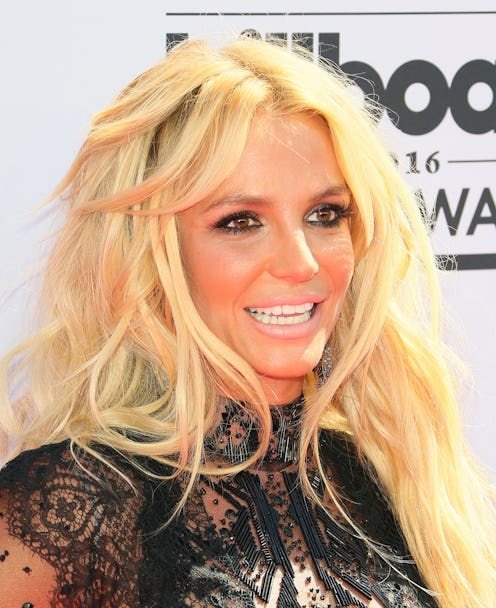 Britney Spears wears a sheer LBD and exposes her thong at the 2016 Billboard Music Awards.