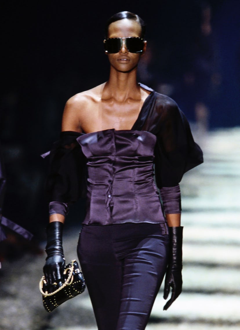 Model Yasmin Warsame carries the 2003-era Horsebit Chain. 