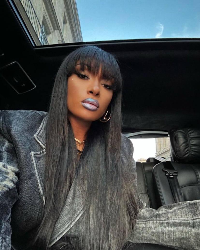 Megan Thee Stallion's metallic blue lip moment was a standout lip combo in 2023.