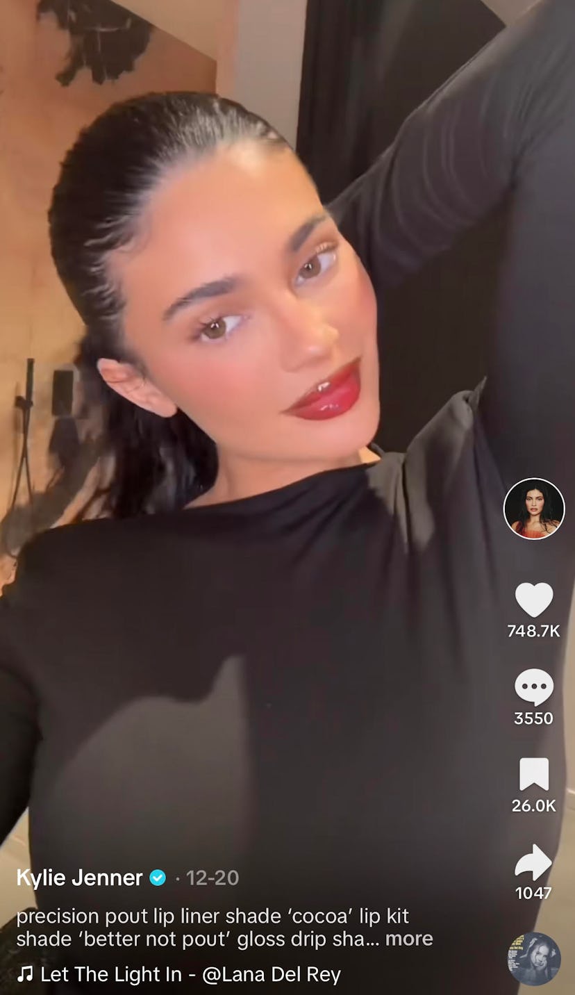Kylie Jenner's "cherry cola" lips were a standout lip combo in 2023.