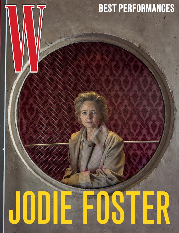 Foster wears a Louis Vuitton jacket, vest, and dress.