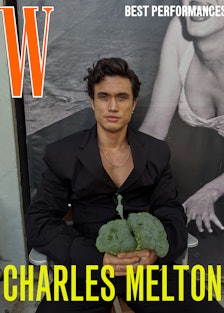 Charles Melton wears a Prada jacket and pants; David Yurman necklace; his own earrings throughout.