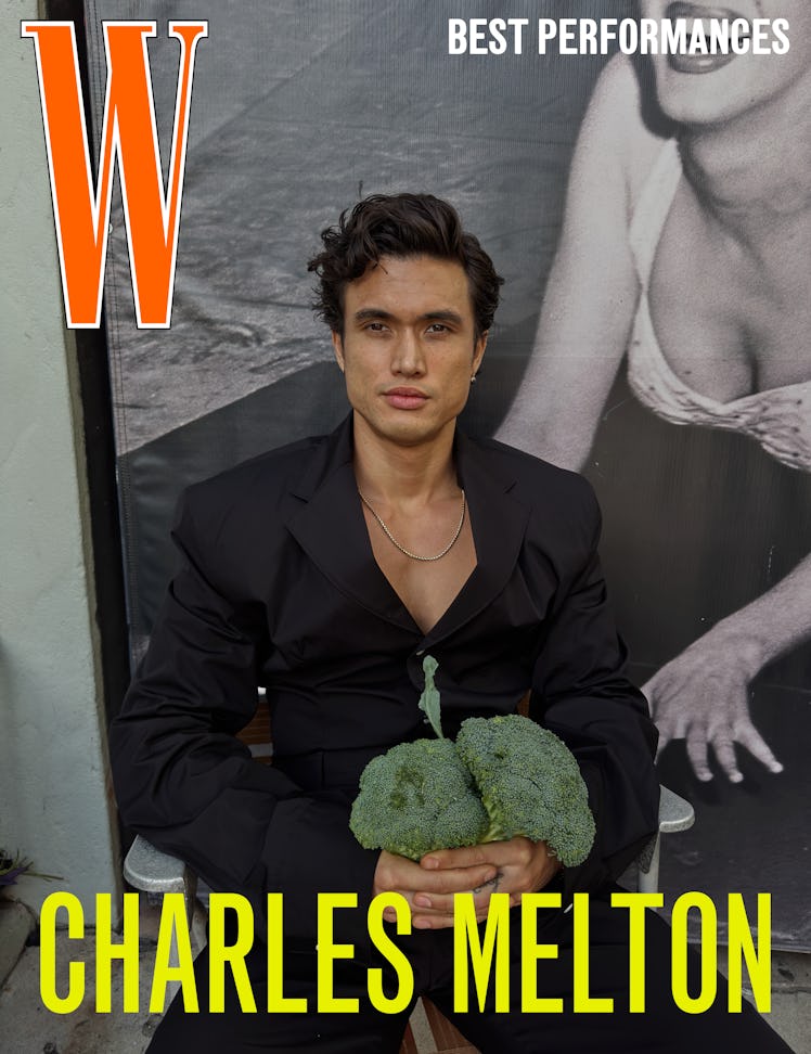 Charles Melton wears a Prada jacket and pants; David Yurman necklace; his own earrings throughout.