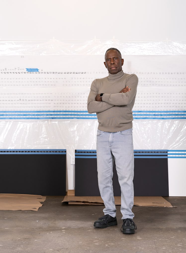 Artist Charles Gaines in his studio, with installation tests for his 1993–2023 work 'Submerged Text:...