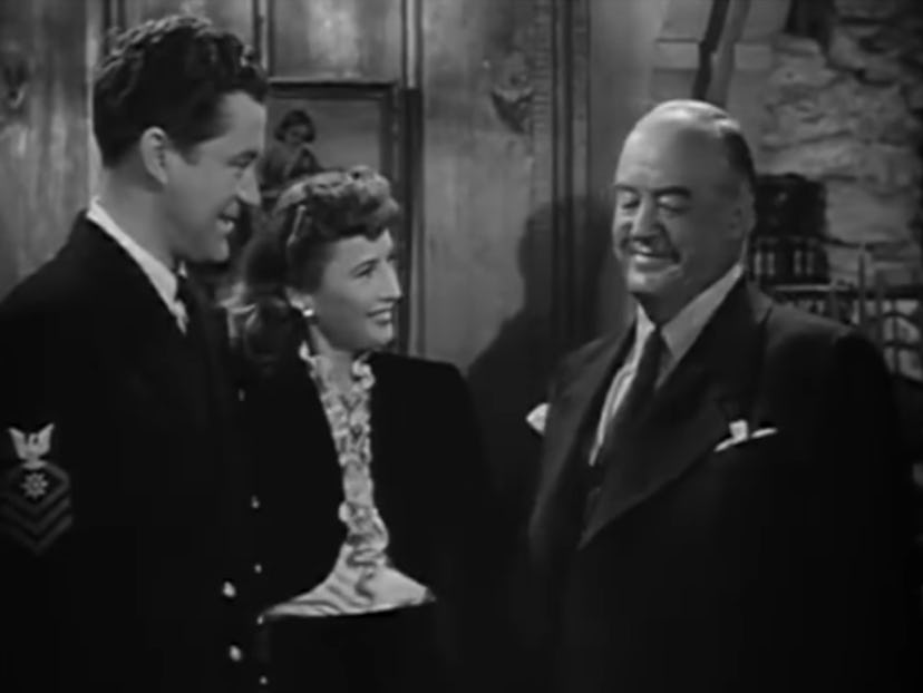Dennis Morgan, Barbara Stanwyck, and Sydney Greenstreet in 'Christmas in Connecticut,' a classic hol...