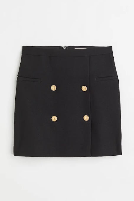 This black mini skirt looks like the one Taylor Swift wore to the Kansas City Chiefs game to support...