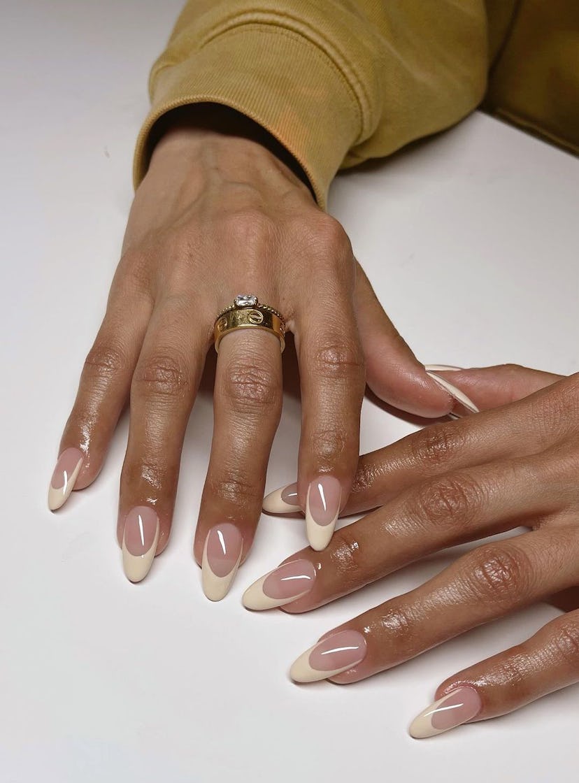 Serving some festive manicure inspo for holiday nails in 2023, vanilla French manicures are a simple...