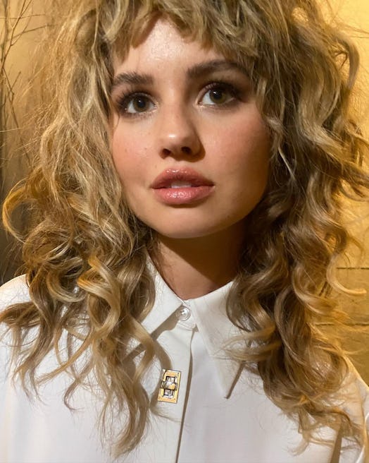 Debby Ryan has found her signature haircut for her curly hair in the trending “wolf cut."