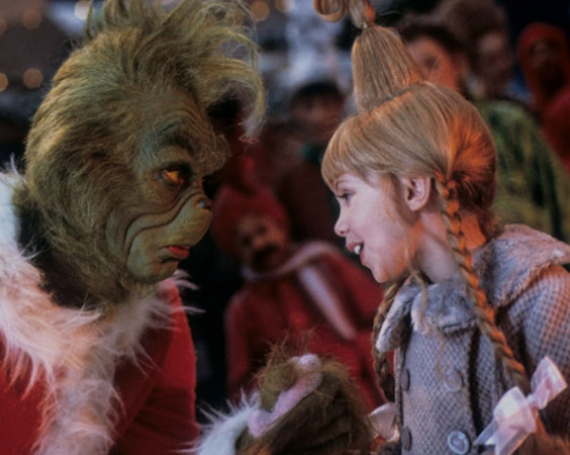 Jim Carrey as the Grinch and Taylor Momsen as Cindy-Lou Who in 'Dr. Seuss' How The Grinch Stole Chri...