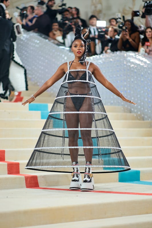 To the 2023 Met Gala, Janelle Monáe wore an exposed Chanel bikini.