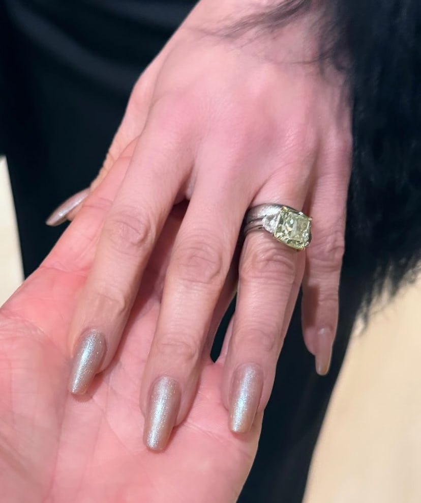 Jennifer Lopez's gold chrome nails were painted by celebrity manicurist Tom Bachik.