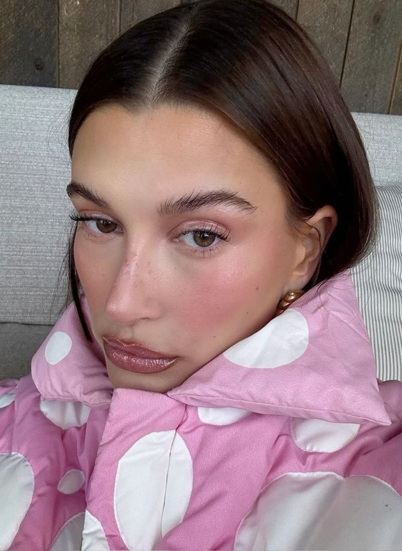 Hailey Bieber enhances her "sugar plum fairy makeup" with some faux freckles thanks to the Beaubble ...
