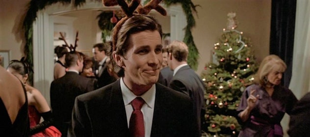 Patrick Bateman wearing reindeer antlers at a Christmas party in 'American Psycho.'