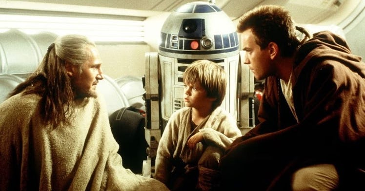 Qui-Gon Jinn (Liam Neeson), Anakin Skyalker (Jake Lloyd), and Obi-Wan Kenobi (Ewan McGregor) in Star...