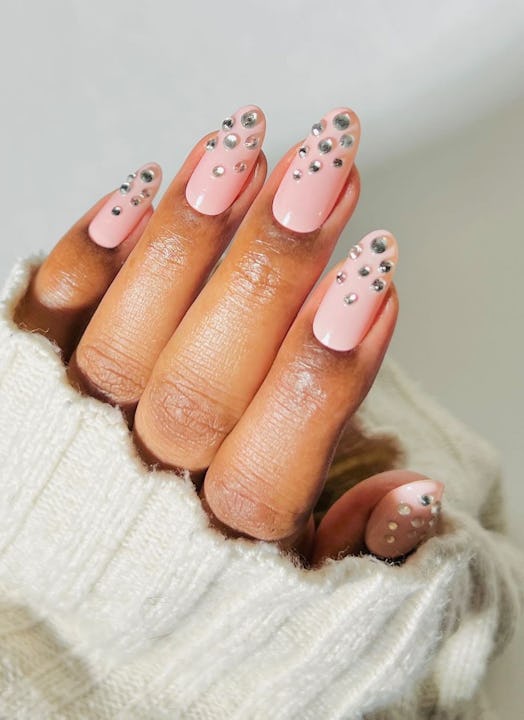 Bubble bath nails with glamorous rhinestones are an on-trend manicure