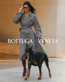 Kendall Jenner walks her dog Pyro for a Bottega Veneta ad.