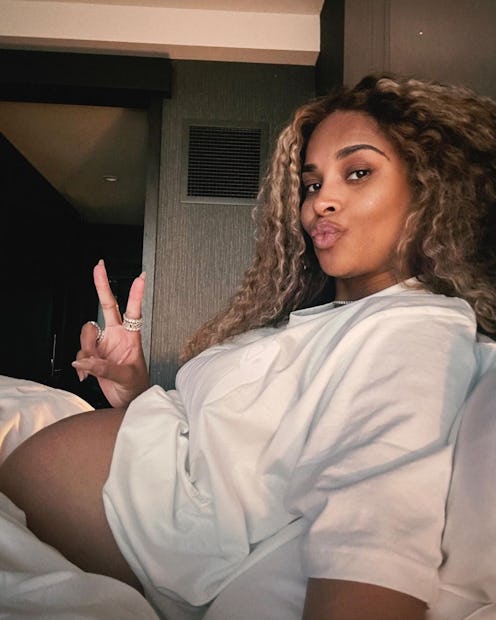 pregnant ciara with curly hair and baby bump
