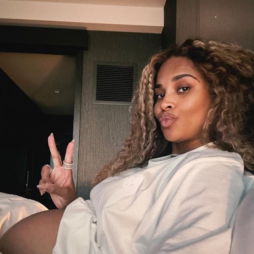 pregnant ciara with curly hair and baby bump